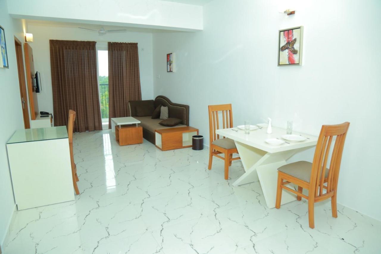 Utsavam Hotel Apartments Guruvāyūr Extérieur photo