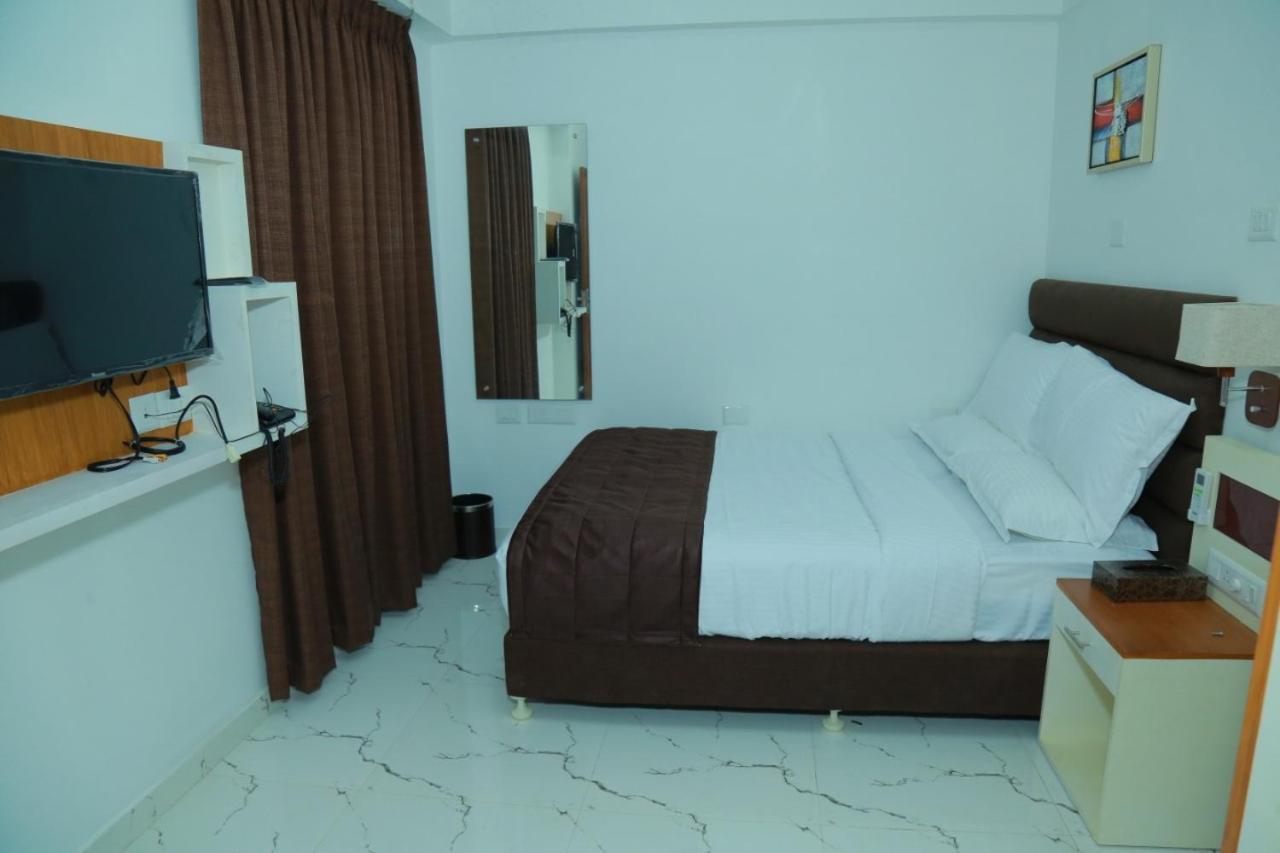 Utsavam Hotel Apartments Guruvāyūr Extérieur photo