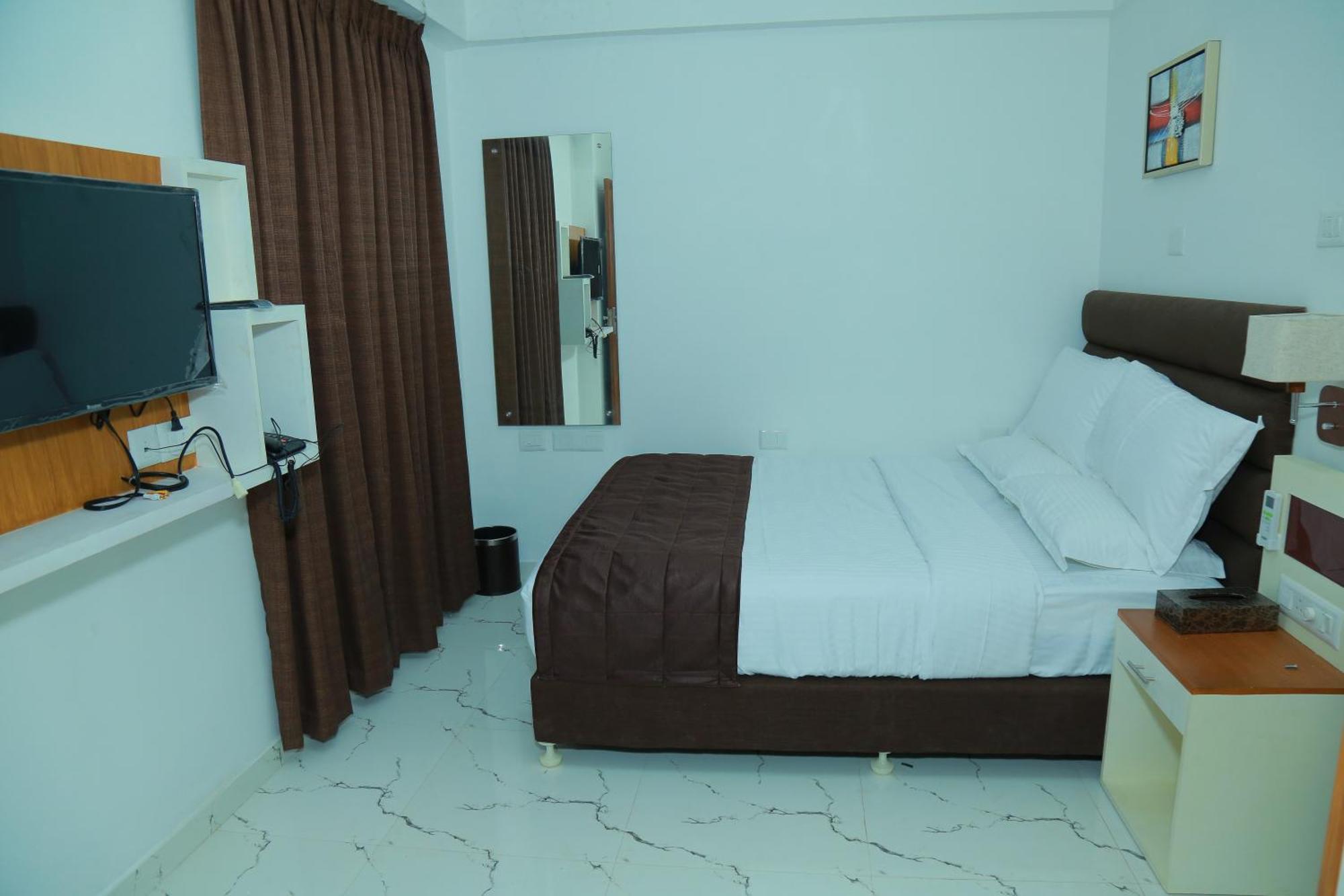 Utsavam Hotel Apartments Guruvāyūr Extérieur photo