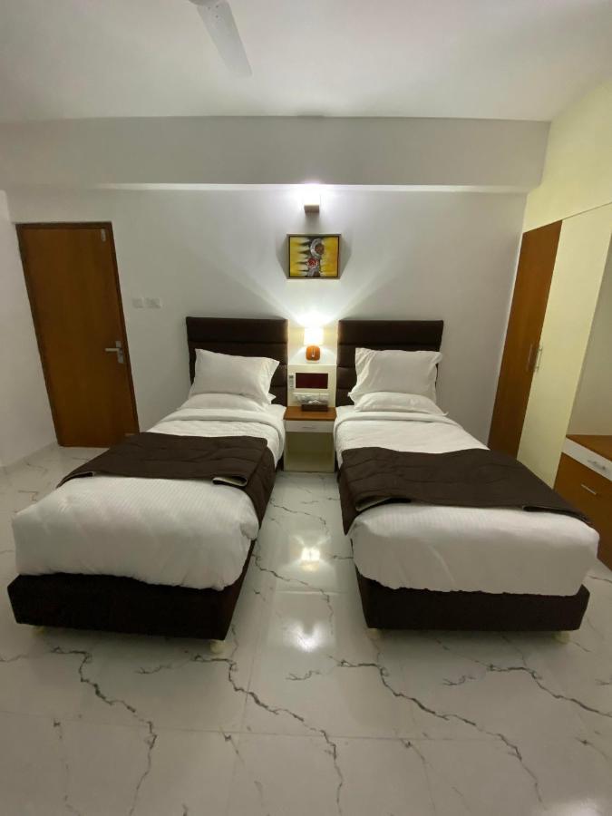 Utsavam Hotel Apartments Guruvāyūr Extérieur photo